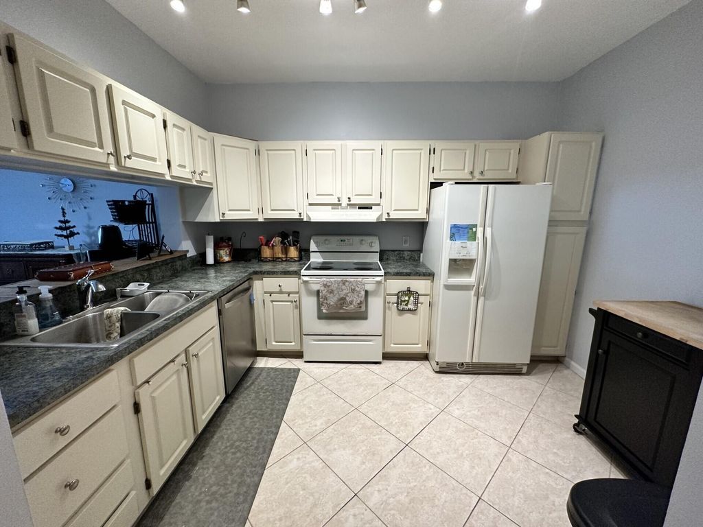 Photo of 101 Cypress Point Drive #101, Palm Beach Gardens, FL 33418 (MLS # R10996666)