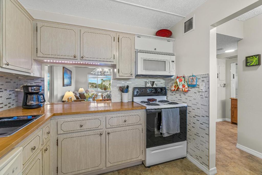 Photo of 2562 N Garden Drive #306, Lake Worth, FL 33461 (MLS # R10950034)