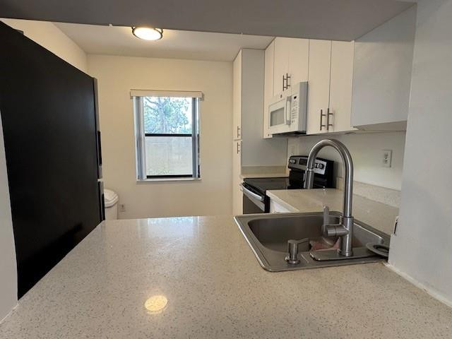 TRADEWINDS A CONDO UNIT 104 - Residential Lease