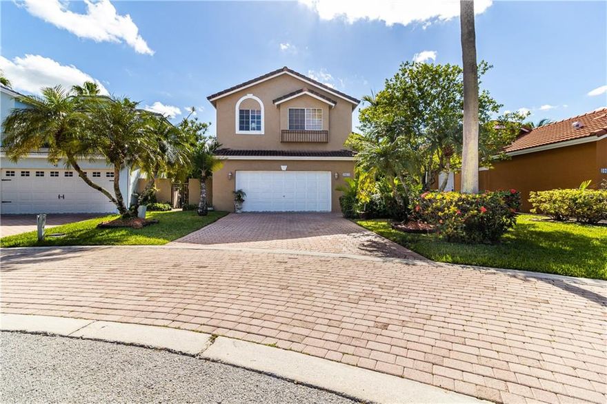 Rarely Available 3BR 2.5BA home in Portraits! Great for entertaining this large open concept home features vaulted ceilings with great natural light. The large living area descends into the serene paved patio with grand lake views and mature vegetation in every direction. Oversized master suite includes a walk in closet, and a separate shower/spa tub in large master bath. Kitchen opens to living area and includes dazzling water views. Formal dinning great for family dinners. Private backyard offers huge potential for many different entertainment areas. Plenty of storage throughout including a 2 car garage. One of the lowest association fees in the area includes: Sprinkler maintenance, cable, and community pool. Close to Pembroke Lakes Mall, C.B Smith Park, and an abundance of dining.