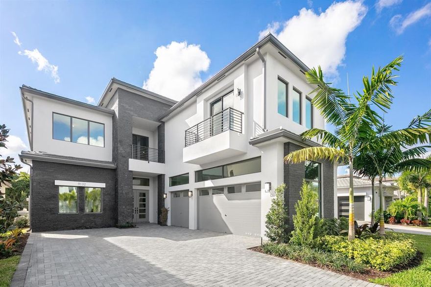 GL Builder Warranty thru 11/23. Situated within the highly desirable community of Boca Bridges, one of South Florida's most prestigious gated luxury communities, 9132 Benedetta Way is an impressive two-story residence permeated with themes of clean lines, sophisticated design and radiating light. This fully upgraded Palma Contemporary residence boasts over 5,815 SF living and features 5 bedrooms, 6 full bathrooms, a custom office, formal dining room, entertainment room with wet bar, media room, second floor loft and 3 car garage. Each rendered space is met with soaring ceiling heights that allow for tons of natural light to fill the rooms. The gourmet kitchen features state-of-the art appliances, an oversized chef's island right off the family room and is ideal for gracious entertaining