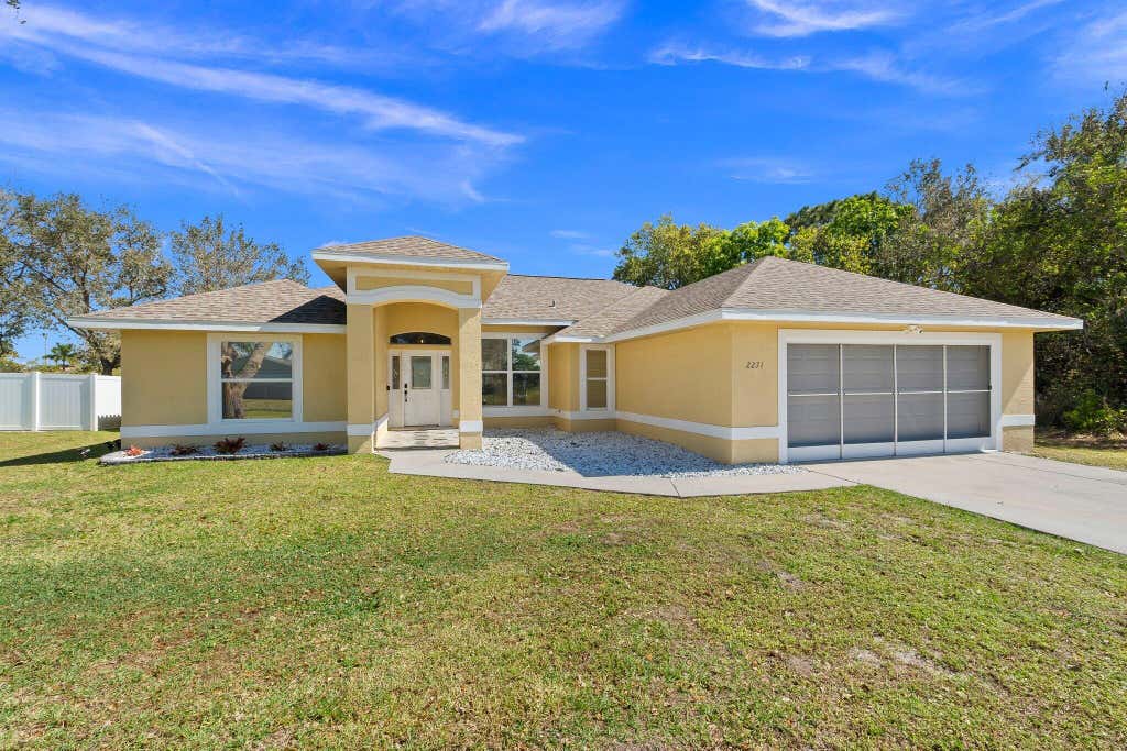 Photo of 2271 SW Chestnut Lane, Port Saint Lucie, FL 34953 (MLS # R10962621)