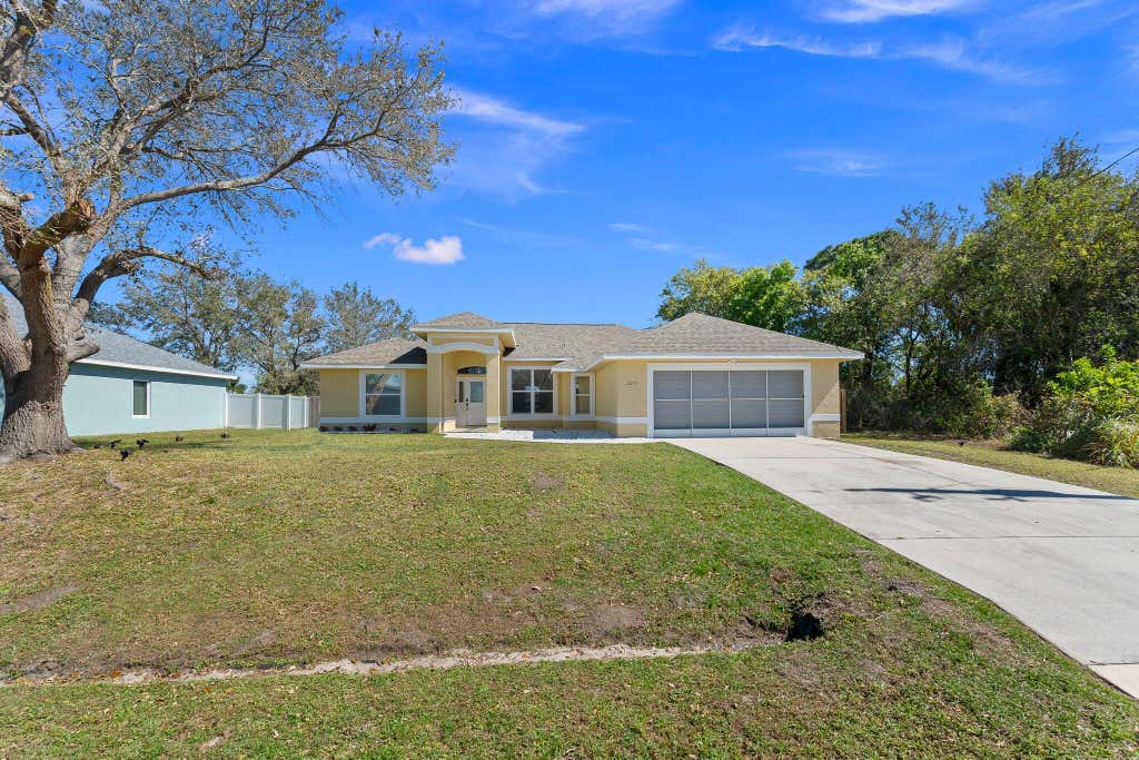 Photo of 2271 SW Chestnut Lane, Port Saint Lucie, FL 34953 (MLS # R10962621)