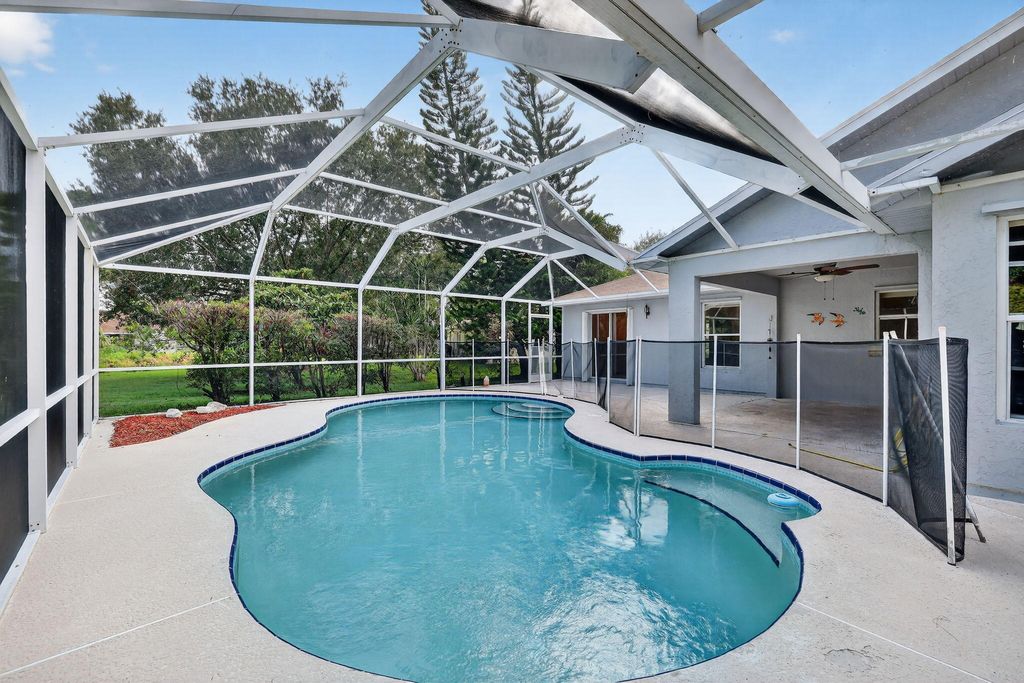 Photo of 3799 SW Ottawa Street, Port Saint Lucie, FL 34953 (MLS # R11120375)