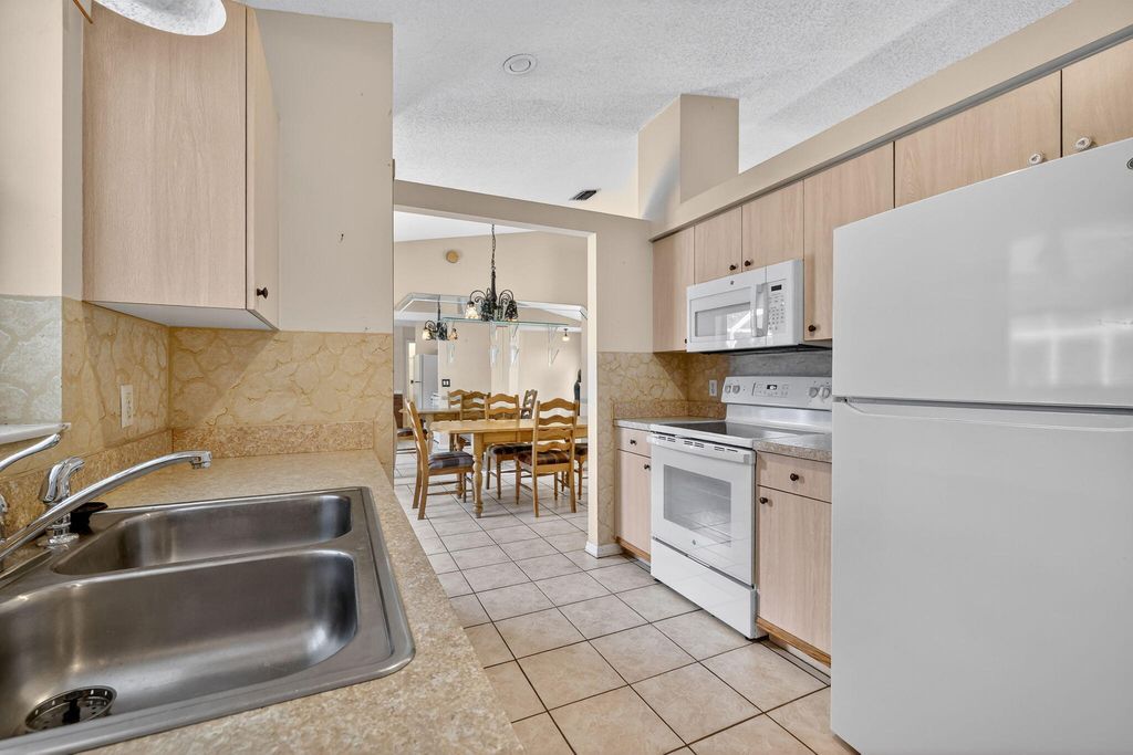 Photo of 3799 SW Ottawa Street, Port Saint Lucie, FL 34953 (MLS # R11120375)