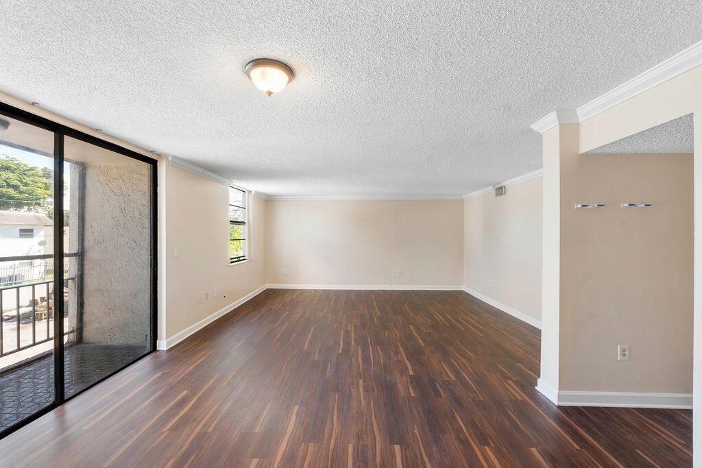 Photo of 1794 NW 55TH Avenue #203, Lauderhill, FL 33313 (MLS # B26081521)