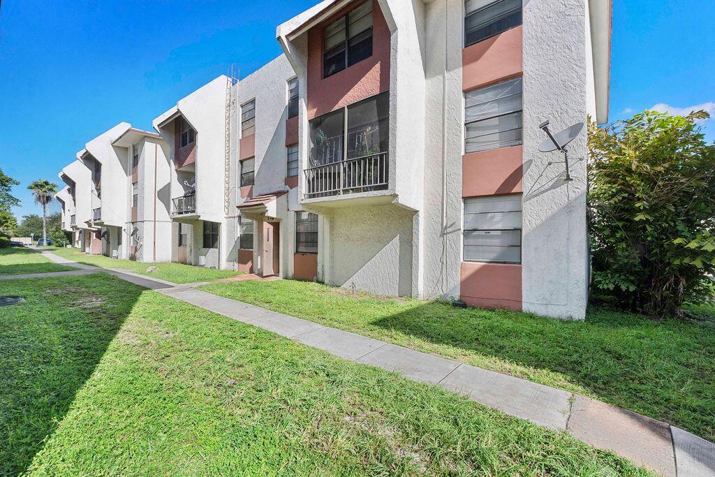 Photo of 1794 NW 55TH Avenue #203, Lauderhill, FL 33313 (MLS # B26081521)