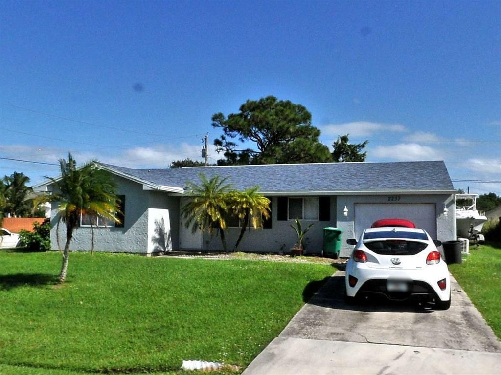 Photo of 2237 SE Short Street, Port Saint Lucie, FL 34952 (MLS # R10767030)