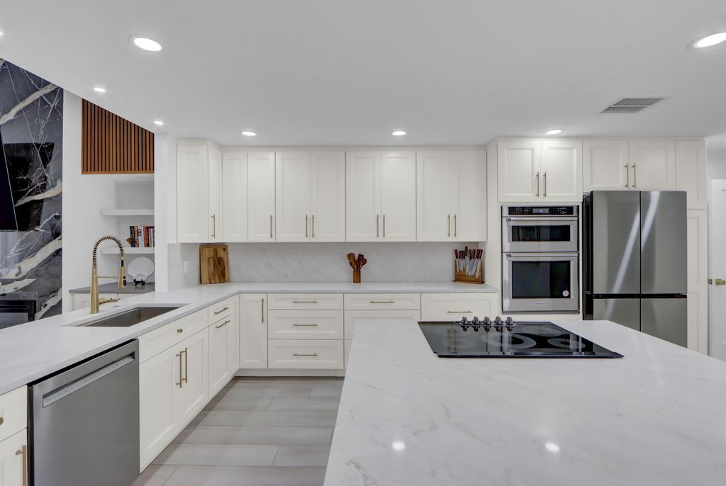 Photo of 39 Edinburgh Drive, Palm Beach Gardens, FL 33418 (MLS # R11135499)