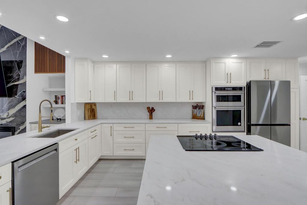 Photo of 39 Edinburgh Drive, Palm Beach Gardens, FL 33418 (MLS # R11135499)