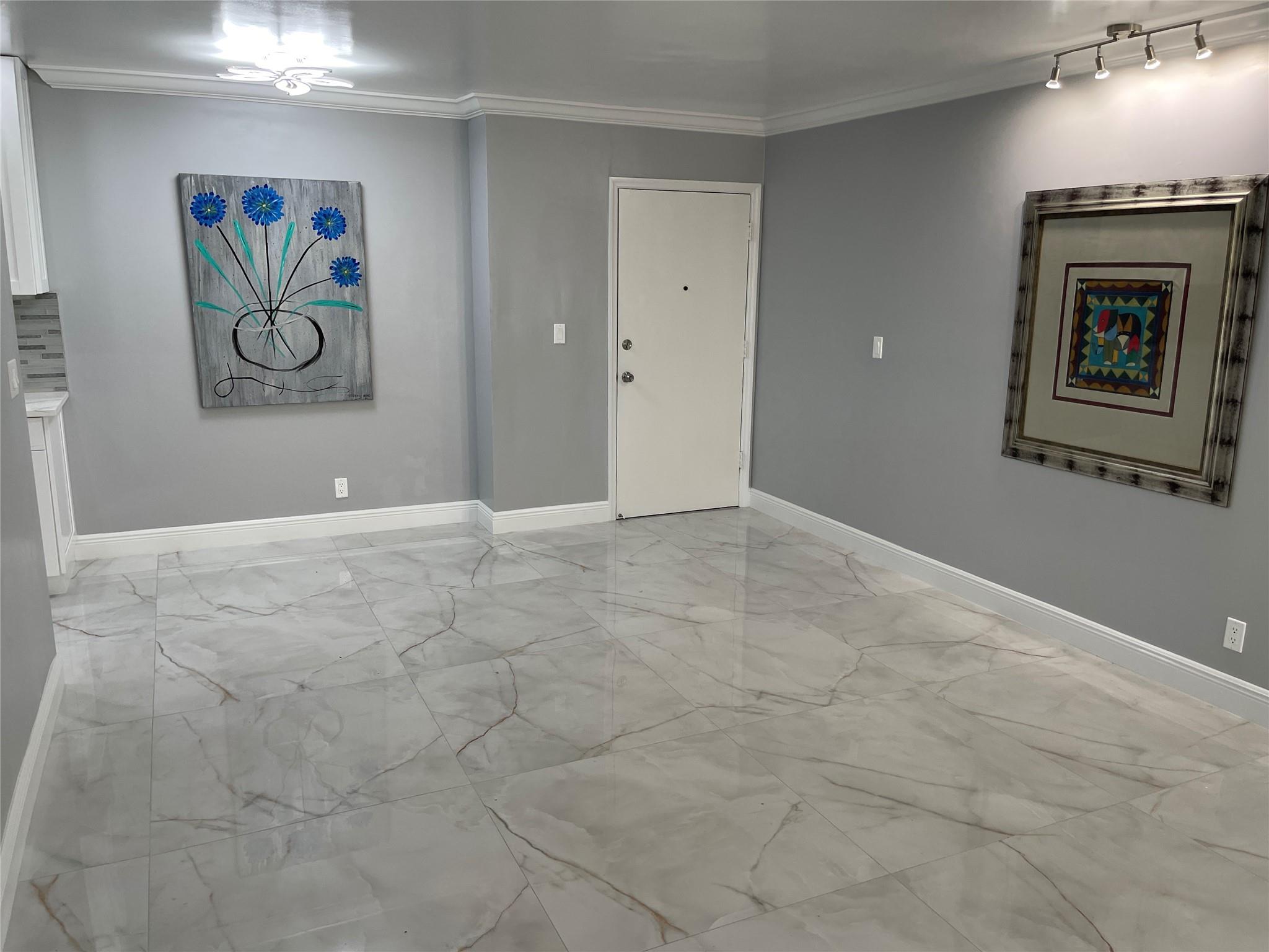 Almost like a brand new property, everything was replaced including floors, windows, the entire kitchen including appliances and lights. This spacious rental condo features 24 x 24 porcelain tiles throughout, new kitchen cabinets and stainless steel appliances, quartz counter tops, impact windows. The complex is very centrally located only 3 miles straight to the beach, near i95 for an easy drive to Miami or West Palm Beach. Both the airport and seaport are only a few minutes away. This is a community for people who are a minimum of 55 years of age and with a minimum credit score of 650. Come make this your home. Call for details