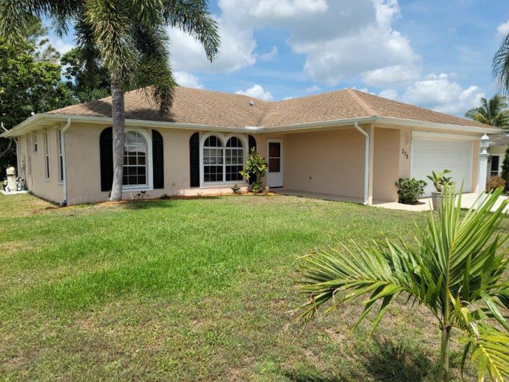 Photo of 208 W Arbor Avenue, Port Saint Lucie, FL 34952 (MLS # R10713566)