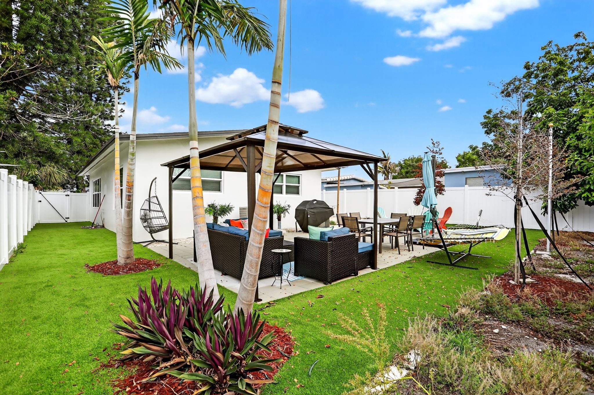 Yearly Rental – Fully Furnished | $3,800/month
Welcome to this beautifully renovated one-story beachside retreat in the heart of Pompano Beach! This fully furnished 3-bedroom, 2-bathroom home is filled with natural light and modern charm. Enjoy peace of mind with full impact windows and updated systems throughout. The custom white kitchen features a stunning waterfall island and opens seamlessly to the spacious family room—perfect for entertaining. The fenced backyard offers privacy and space to relax outdoors. Just 1 mile to the beach and half a mile to I-95, this turnkey home is ideally located near everything. Available for yearly lease at $3,800/month.