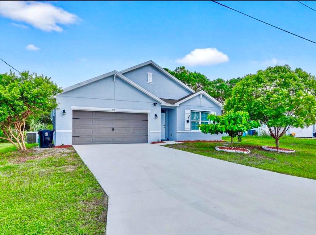 Photo of 518 SW Natalie Terrace, Port Saint Lucie, FL 34953 (MLS # F10537069)