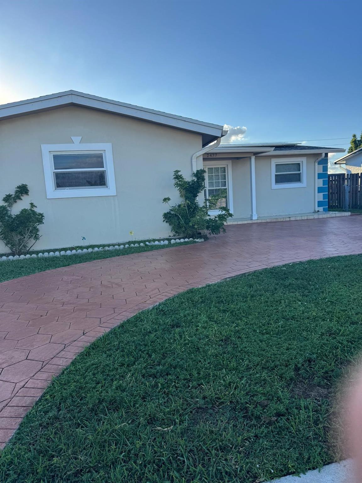 Bright and spacious single-family home featuring 3 bedrooms and 2 bathrooms in a quiet Sunrise neighborhood. Enjoy a modern kitchen with stainless steel appliances, tile floors throughout, and updated bathrooms. The home offers a large fenced backyard—perfect for outdoor entertaining or family gatherings—plus a driveway and garage for convenient parking. Located near top-rated schools, shopping, dining, and major highways, this property combines comfort and accessibility. Move-in ready and easy to show!
