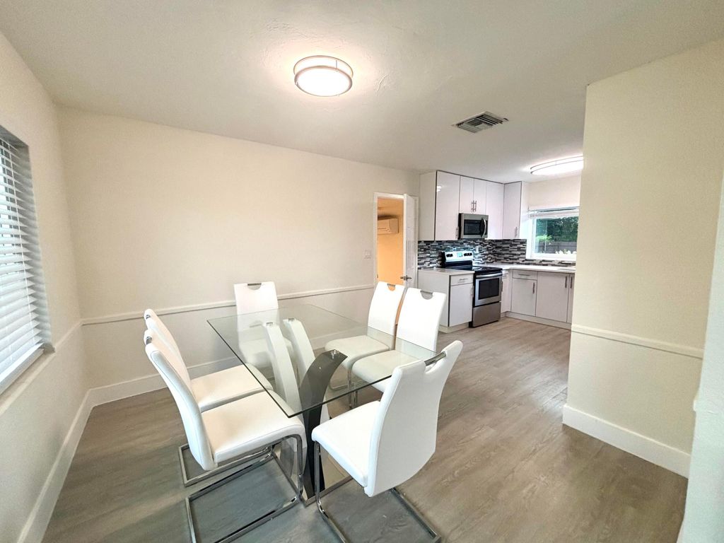 Photo of 323 NW Spanish River Boulevard, Boca Raton, FL 33431 (MLS # R11162495)