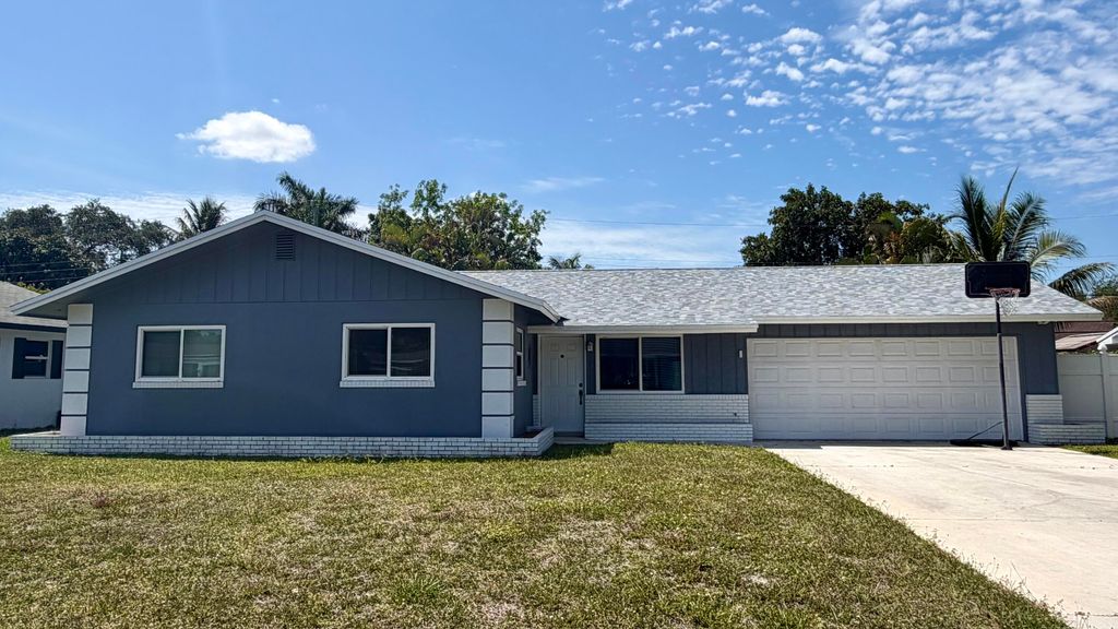 Photo of 3344 Vagabond Road, Lake Worth, FL 33462 (MLS # B26022313)