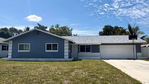 Photo of 3344 Vagabond Road, Lake Worth, FL 33462 (MLS # B26022313)