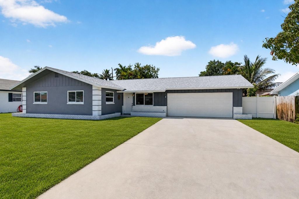 Photo of 3344 Vagabond Road, Lake Worth, FL 33462 (MLS # B26022313)