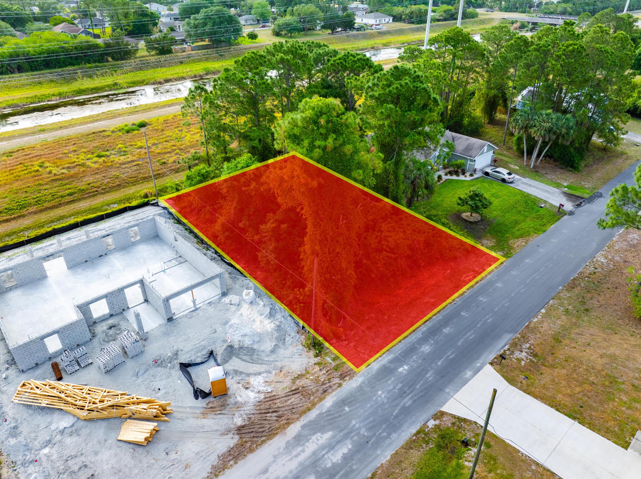 Enjoy extra breathing room in the backyard with this centrally located Palm Bay lot! Backing up to a wide open area followed by a canal, this quarter-acre homesite offers added privacy and a natural buffer from rear neighbors. Whether you're building now or holding as an investment, you'll love the peaceful setting. Bring your own builder or choose from 35 thoughtfully designed floor plans we offer to make the process even easier.