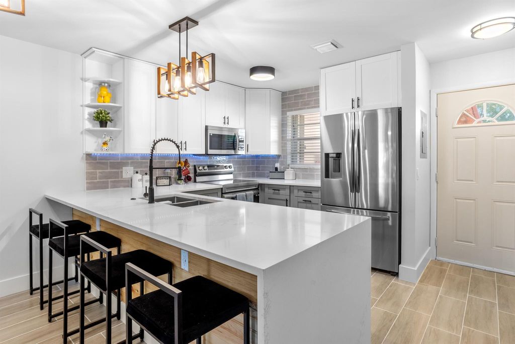 Photo of 12009 Poinciana Boulevard #205, Royal Palm Beach, FL 33411 (MLS # R11122229)