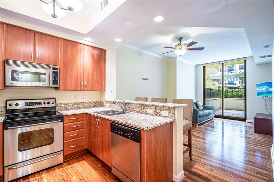 RARE CONDO FOR SALE! THIS IS AN A CHARMING 1 BEDROOM WITH WALK IN SHOWER PLUS A HALF BATH CONDO ON THE 7TH FLOOR WITH LARGE PATIO NEXT TO A WATERFALL, A/C 3 YEARS NEW, LAMINATE WOODEN FLOOR IN LIVING AREA WITH CARPET IN BEDROOM, 
 STACKABLE WASHER DRYER,  NO TUB, WALK IN SHOWER, A MUST SEE! AGENT LIVE IN BUILDING AND EASY TO SEE ON SHORT NOTICE. THE 7TH FLOOR HAS THE GREAT GYM WITH CLUBROOM.  24/7 SECURITY WITH 24/7 LOBBY PERSON, HEATED SWIMMING POOL ON ROOF WITH AMAZING VIEWS OF PALM BEACH, OCEAN VIEW GRILLING TOO! SAUNA AND STEAM ROOM. ALL IMPACT GLASS, NO ASSESMENTS, GREAT RESERVES IN BUILDING, LIVE IN ONE OF THE BEST BUILDINGS DOWNTOWN.