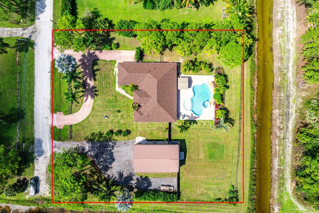 Photo of 15745 66th Court N, Loxahatchee, FL 33470 (MLS # R11131055)