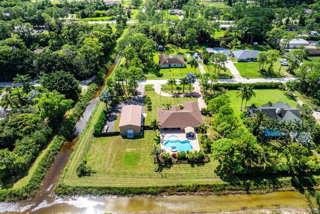 Photo of 15745 66th Court N, Loxahatchee, FL 33470 (MLS # R11131055)