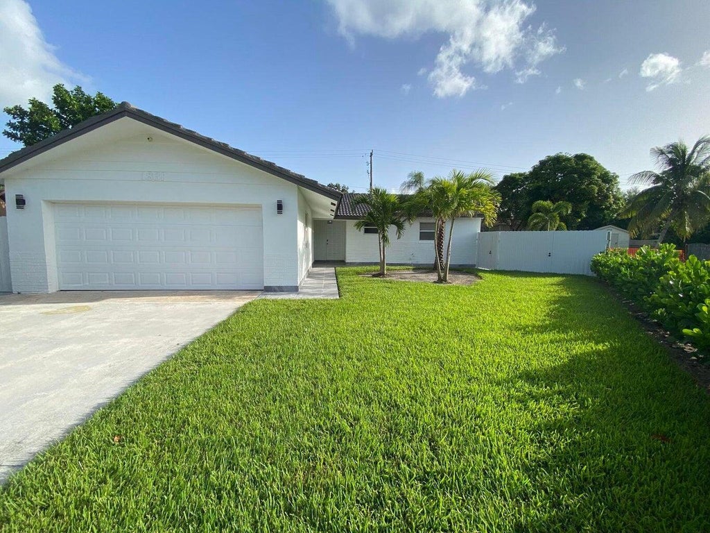 Photo of 1831 EAST Court, Lake Clarke Shores, FL 33406 (MLS # B26079648)