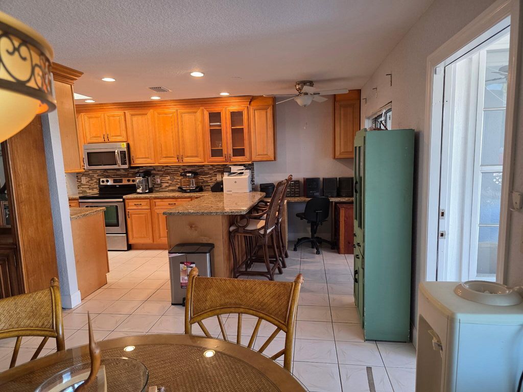 Photo of 3368 Rossi Court, West Palm Beach, FL 33417 (MLS # R11163865)