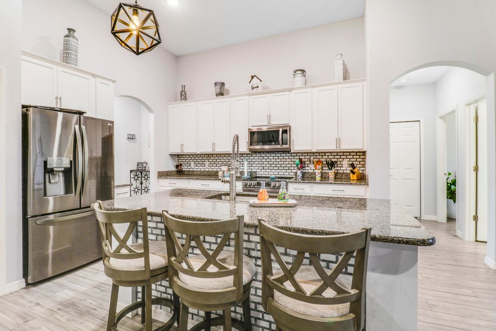 Photo of 2358 SW Blaine Terrace, Port Saint Lucie, FL 34953 (MLS # R11021593)