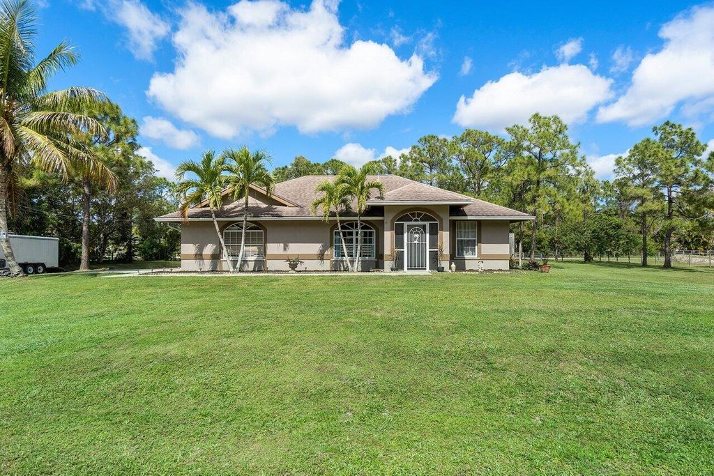 Photo of 18347 Murcott Boulevard Blvd, The Acreage, FL 33470 (MLS # R10779347)