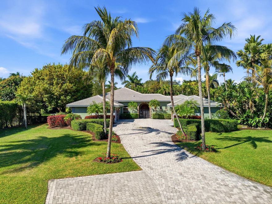 Opportunity to acquire a premier one-acre parcel in the desirable Delray Lakes Estates community of West Delray Beach. Spanning approximately 43,564 square feet, the lot provides substantial space, privacy, and flexibility for a variety of uses. Well suited for those pursuing land value, expansion, or a custom build, the existing residence offers 5 bedrooms and 4.1 bathrooms, allowing for immediate occupancy or an opportunity to reimagine or build your dream estate. The size and layout of the lot support potential for a courtyard-style home, guest house, resort-style pool, and outdoor living areas while preserving open green space and privacy. Located within an established neighborhood with convenient access to top schools, dining, shopping, and major roadways, this property offers a  balance of privacy, serenity and accessibility. Lots of this size in this area are limited, presenting exceptional long-term value and potential.