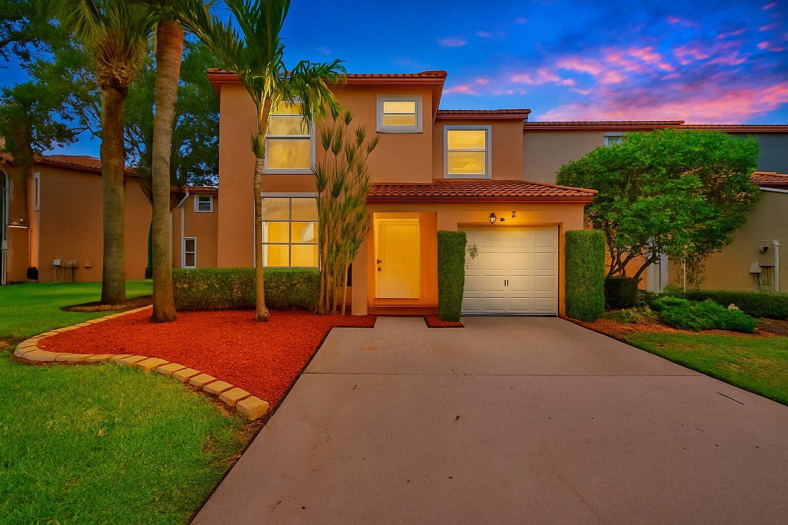 Step into this beautifully updated 3-bed, 2.5-bath home on a spacious corner lot. Timeless elegance meets modern luxury throughout this fully renovated property.Enjoy rich wood-grain flooring with water-resistant technology and a high-performance protective topcoat perfect for busy households. The kitchen features quartz countertops, stainless steel appliances, sleek soft-close cabinetry, bold black-and-gold hardware, and elegant chandeliers. A dramatic black staircase adds a striking focal point.Spa-inspired bathrooms include floating vanities, LED mirrors, marble-style tile, and gold rainfall fixtures. A new roof (2022) offers peace of mind.Located in a resort-style community with pools, courts, playgrounds, and picnic areas- all close to A-rated schools, shopping, and dining.
