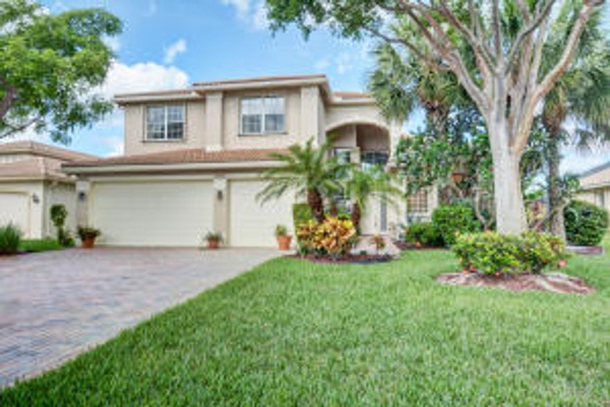 Picture perfect lake views from allover this Santiago model, situated in a cul de sac. Feels like two homes in one. Spacious first level has open gourmet kitchen,(granite & wood) family room, formal living & dining rooms,1/2 bath, a generous master suite & guest suite with bath. All overlooking large screened patio & lake. 2nd level has a huge loft area, two more bedrooms & baths. There's neutral tile through living areas, carpet in the bedrooms. All impeccably maintained, ready for your touches.
Valencia Shores offers 2 resort style club houses for sports & social events, 2 pools, fitness &tennis facilities, as well as social events.
Manned gated security, this active adult community is  minutes to shopping, dining, golf & cultural events, I95, turnpike & beaches.