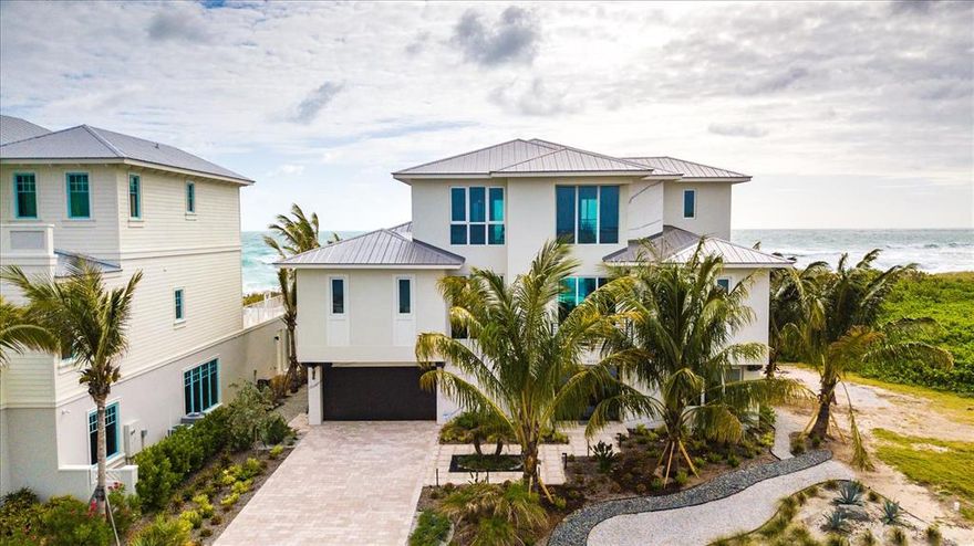 Finally a perfect blend of tranquility & luxury. This modern/contemporary style beach home offers breathtaking views of ocean & river. This home was created w/pleasure being their top priority. Furnished with Designer fittings & accessories of RH, Quartz counter tops, white high gloss porcelain finishes & dark maple wood accents are throughout the house. Superior kitchen with Sub Zero/Wolf App., white Birch center island, butlers pantry, full size beverage station, & 2 of almost every appliance. Spa style En-Suite bathrooms with porcelain tiles, mosaics and premium Decor of RH fixtures & lighting throughout. Perfectly positioned near private airport facilities, state of the art spas, hotels, fishing, shopping, dining. Potential private marina in the future & will house up to a 50ft boat.