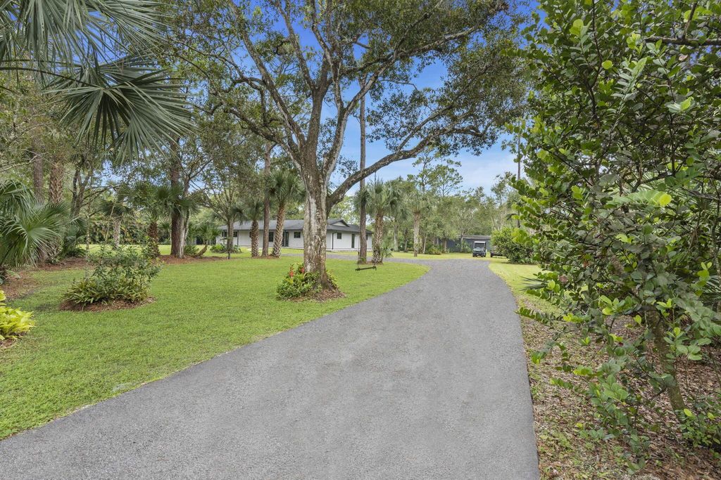 Photo of 17813 133rd Way N, Jupiter, FL 33478 (MLS # R10928531)