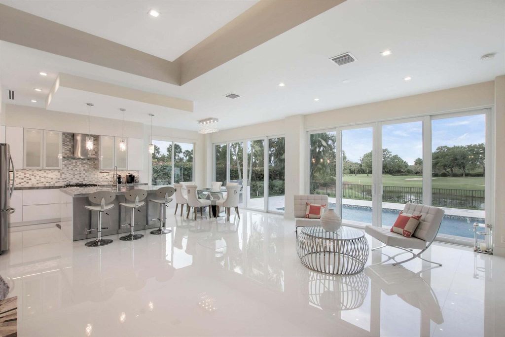 Photo of 124 Golf Village Boulevard, Jupiter, FL 33458 (MLS # R10871147)