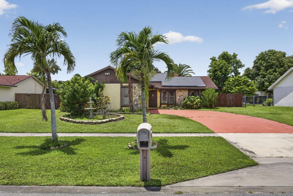 Photo of 254 LA MANCHA Avenue, Royal Palm Beach, FL 33411 (MLS # B26064679)