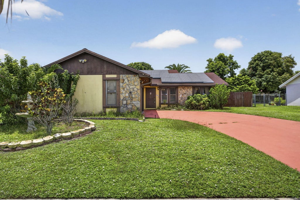 Photo of 254 LA MANCHA Avenue, Royal Palm Beach, FL 33411 (MLS # B26064679)