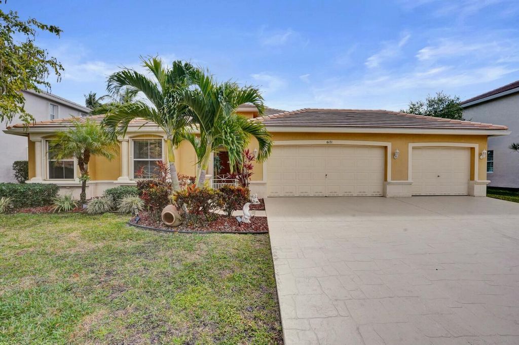 Photo of 6171 Shadow Tree Lane, Lake Worth, FL 33463 (MLS # R11163873)