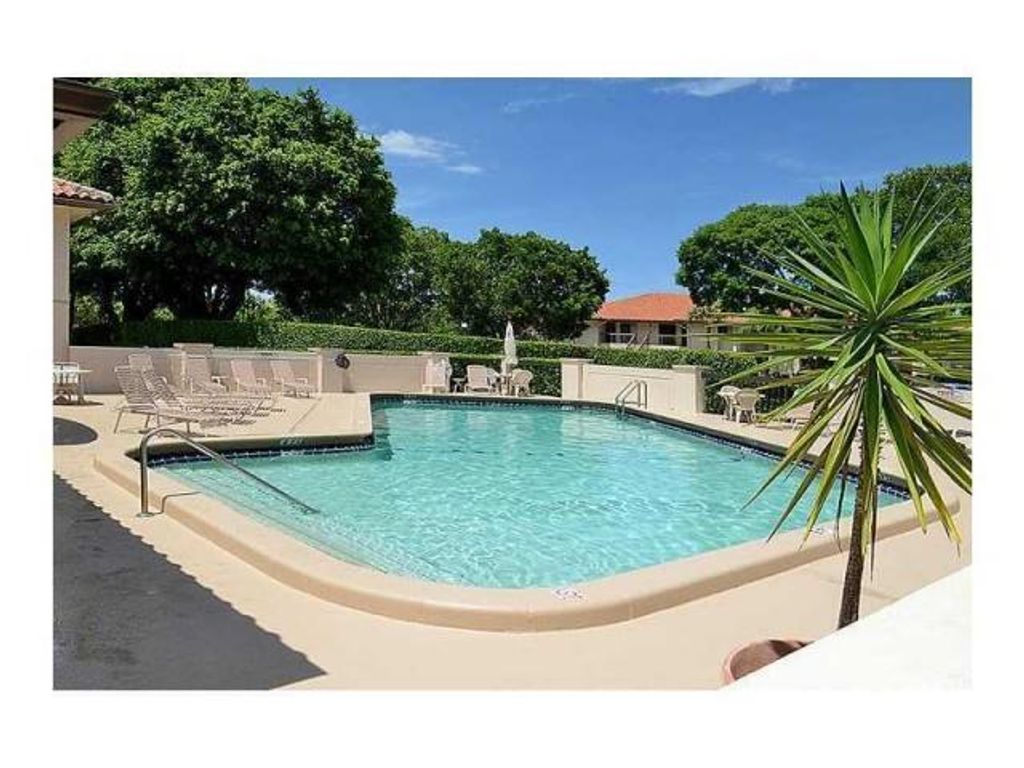 Photo of 5200 E Club Circle #206, Boca Raton, FL 33487 (MLS # B26017591)