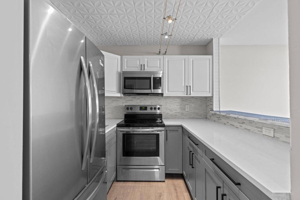 Photo of 228 Camden J, West Palm Beach, FL 33417 (MLS # B26046657)