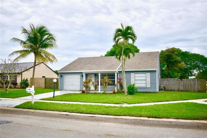 Welcome to this beautiful 3 bedroom and 2 bathroom home. With a large fenced-in back yard perfect for entertaining and kids! Newer roof and water heater installed 2021 and HVAC system replaced less than 1 month ago. The renovated kitchen has cherry wood cabinetry and moldings, stainless steel appliances and granite countertops. Bathroom have also been updated. The large backyard has banana trees and a large mango tree that is perfect for shade during those hot summer months. The covered patio is perfect for entertaining or relaxing after a long day. Room for a pool and/or boat storage space. Easy to show!
