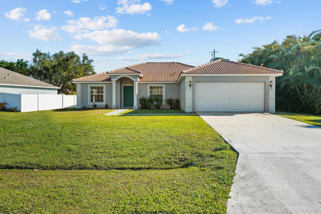 Photo of 4225 SW Elba Street, Port St Lucie, FL 34953 (MLS # R10840179)