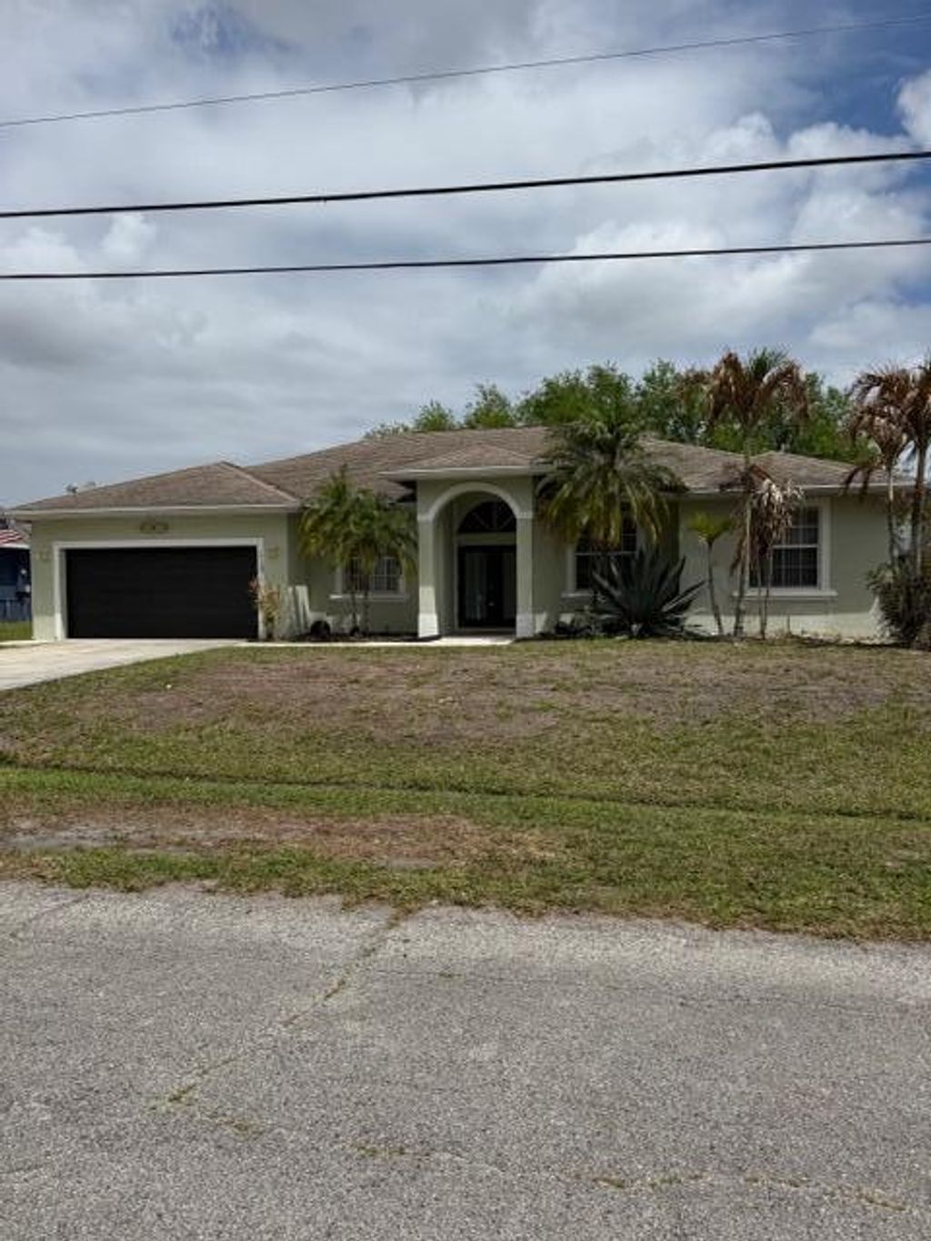 Photo of 522 SE Nome Drive, Port Saint Lucie, FL 34984 (MLS # B26010664)