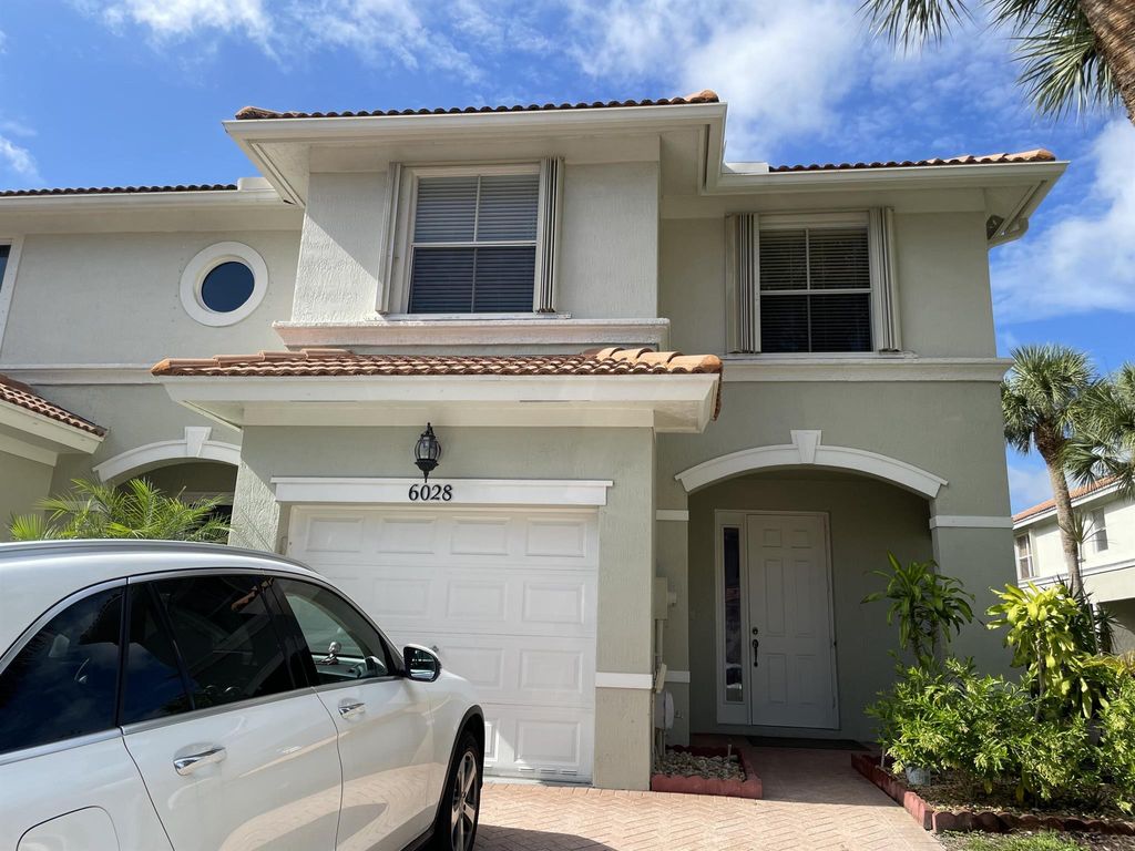 Photo of 6028 Seminole Gardens Circle, Riviera Beach, FL 33418 (MLS # R10905346)