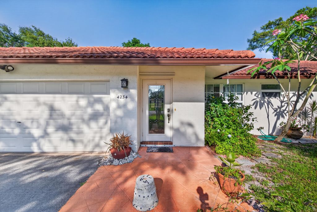 Photo of 4234 NW 3rd Way, Boca Raton, FL 33431 (MLS # B26022960)