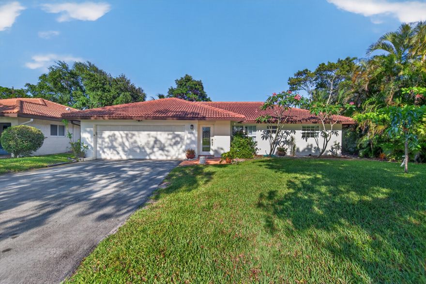A fantastic location in a well-manicured community. This large 2 bedroom, 2 bathroom home features a front living room, enclosed back living area as well as a dining and breakfast area off of the kitchen. The kitchen is the heart of the home and it open to all living spaces. The primary bedroom has a walk in closet, dressing area and separate bathroom. Enjoy the large grassy yard that is a wonderful place to gather, play and celebrate. The home has a spacious 2 car garage, hurricane impact windows and doors, tile roof and gutters. Property has prime location across from the clubhouse with a vast green space between it. With and HOA fee of just $250 per month. Renting okay 1 time per year. Pets welcome.  Pets okay, Lease once a year, this is a 55+ Community and no children under 18 Minimum credit 700 +.  Background check and personal interview also required