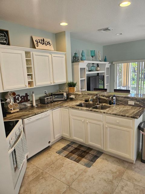 Photo of 8227 Mulligan Circle #A, Port Saint Lucie, FL 34986 (MLS # B26017707)